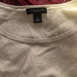 Ann Taylor sweater vest, it’s thin, tan, not thick. Adds style